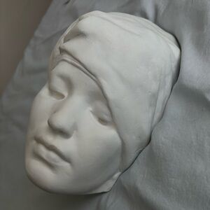SOLD. Nubian female mask plaster cast.